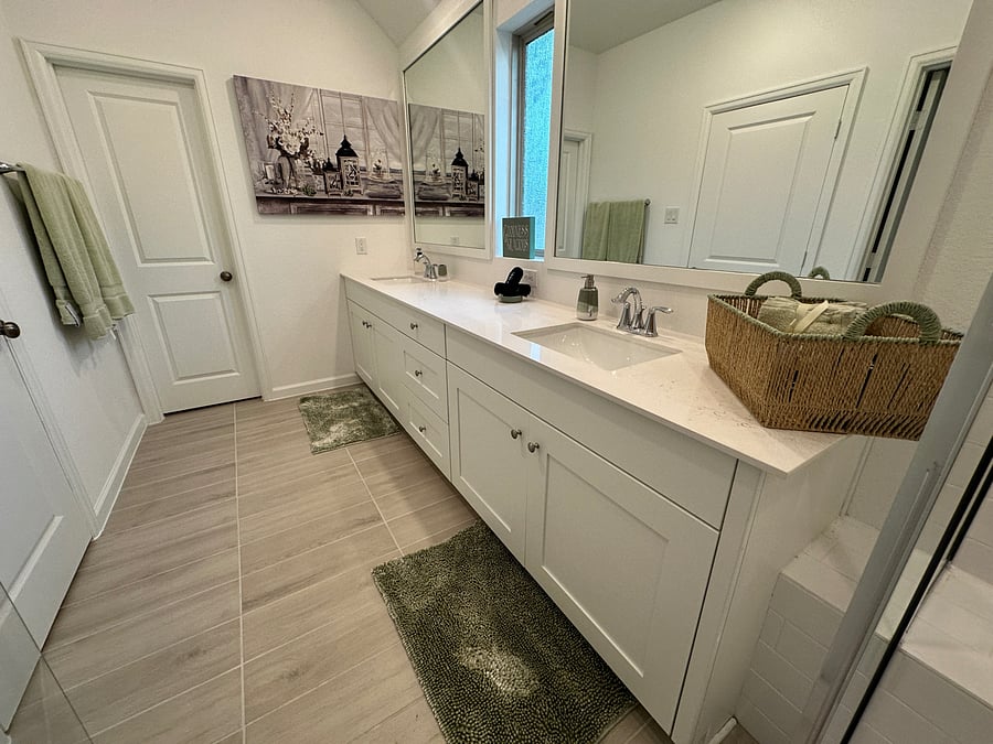 Bathroom in the master suite equipped with soap, shampoo, conditioners, toilet paper, make-up removal towels, plush wash cloths and drying towels.