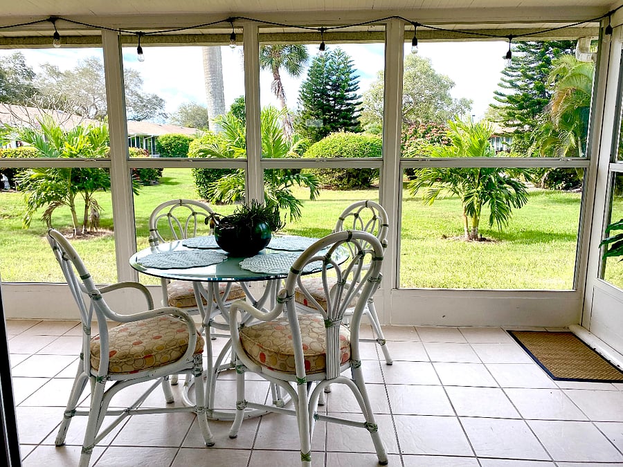 Lanai overlooking lush courtyard