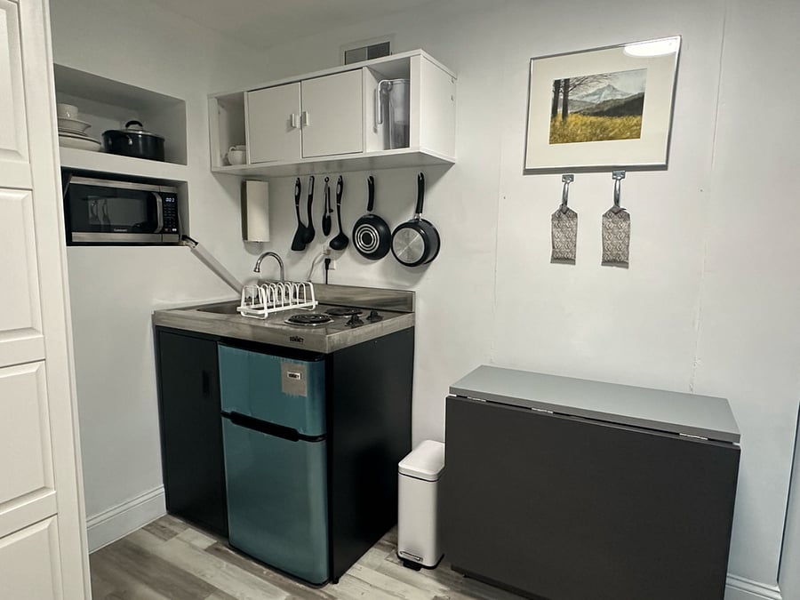 Kitchenette and Mini Fridge with Freezer.