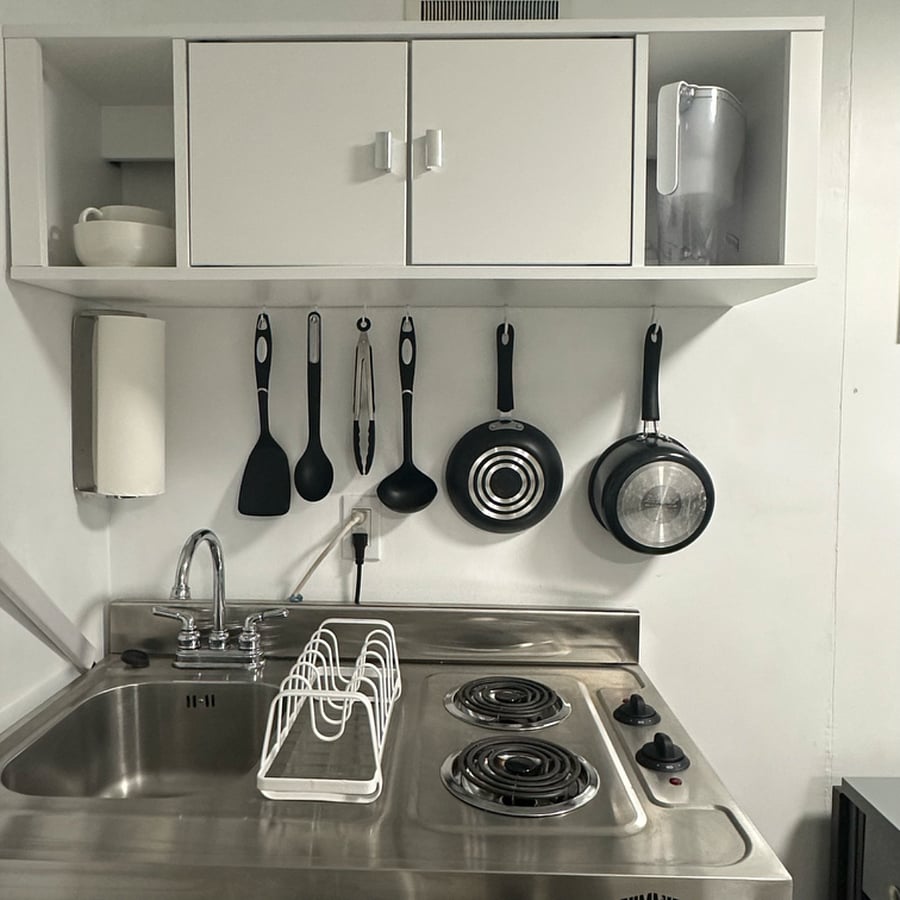 Stovetop, Sink, and Pots and Pans.