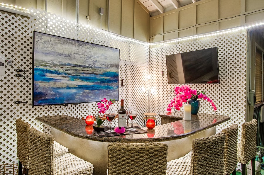 Enjoy a beverage while you watch TV in the outdoor bar.