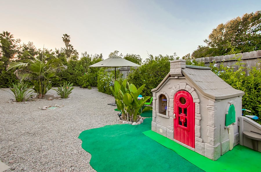 Your children will delight in endless hours of outdoor fun, with ample space to run and play. They can enjoy the playhouse, children's table and chairs, scooters, bikes, balls, and a variety of outdoor games to keep them entertained for hours on end.