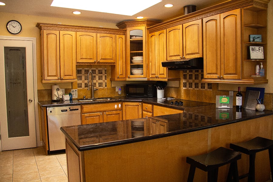 The kitchen is fully equipped to meet all your culinary needs. From a variety of coffee options including Keurig, Espresso, and drip coffee makers to blenders, it has everything you require. Additionally, there's service for up to 24 guests, ensuring you're well-prepared for any occasion.