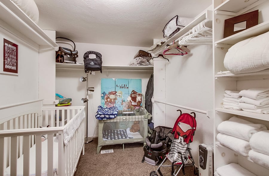 The nursery is tucked away for added privacy, providing a serene space for your little ones. It comes equipped with a crib, port-a-crib, baby bath, stroller, high chair, jump roller, and changing table, ensuring all their needs are met with comfort and convenience.