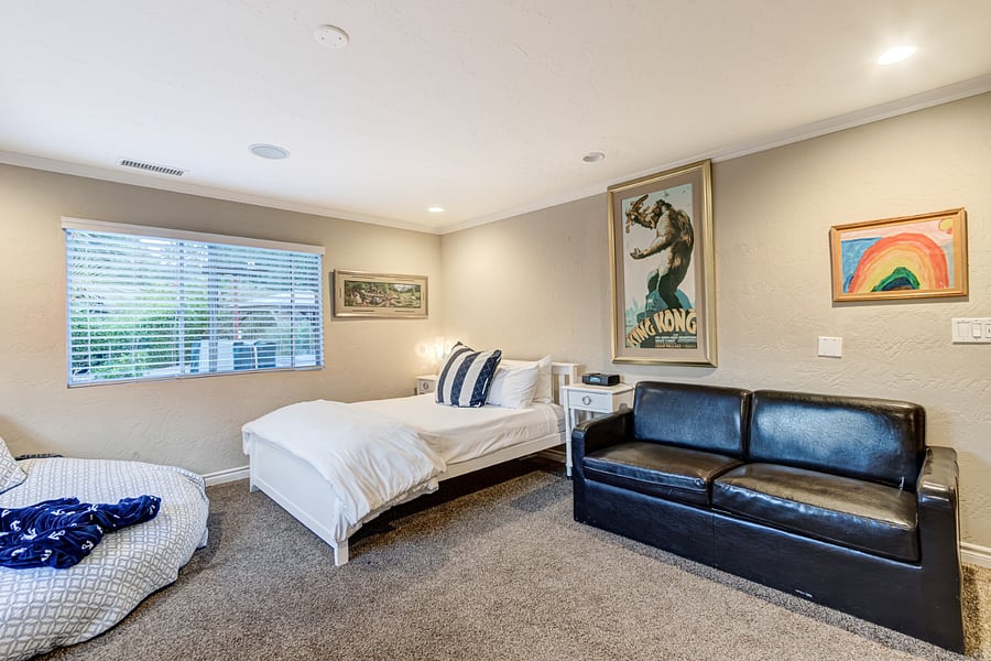 In Bedroom 3, you'll find a queen bed, a king day bed comprising three mattresses, a sofa sleeper, and an XXXL bean bag that kids absolutely love for sleeping and lounging. Additionally, there are plenty of books, games, and LEGO sets to keep children entertained for hours of indoor play.