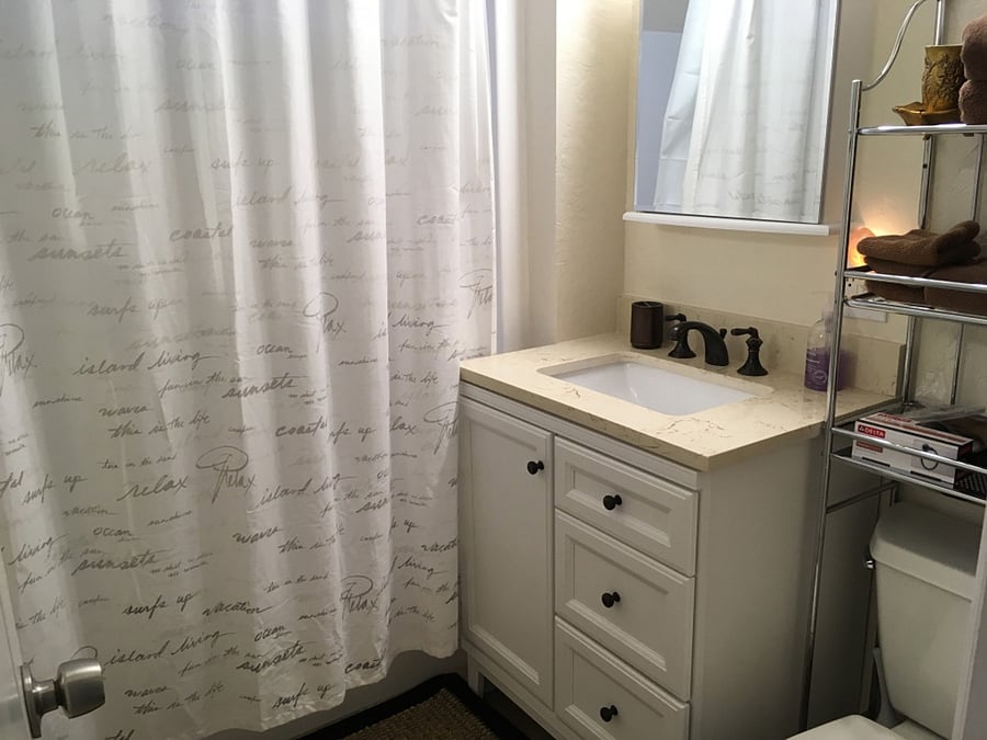 Bathroom has a shower tub and extra toiletries in case you forget.