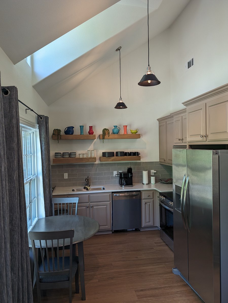 Full kitchen complete with dining table