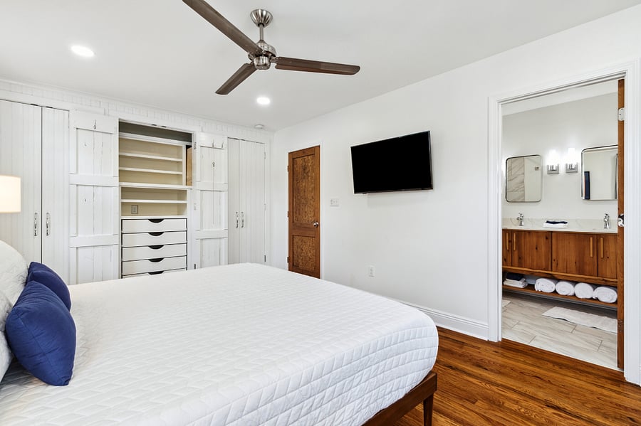 The wall of closets features plenty of storage.
