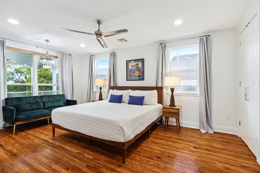 The light-filled primary suite is a true retreat. The blackout curtains provide a dark room for a good nights rest!
