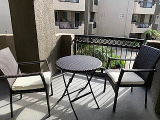 Balcony with table and chairs for morning coffee or afternoon wine