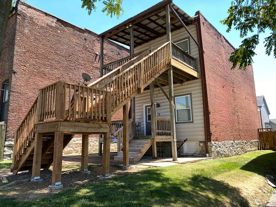 Rear Of The Building & Steps Leading Up To Your Second Floor Apartment