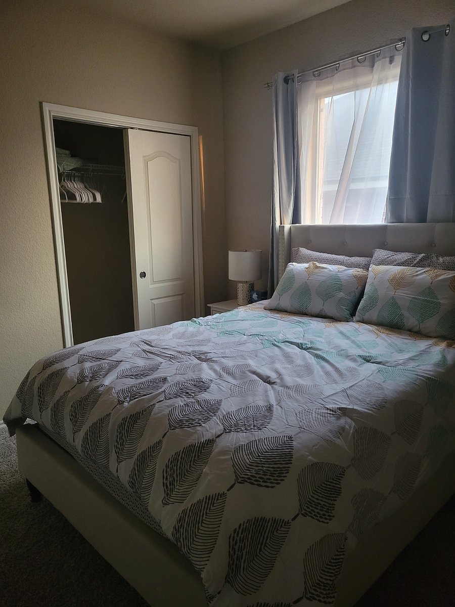 Bedroom 1 queen bed with closet