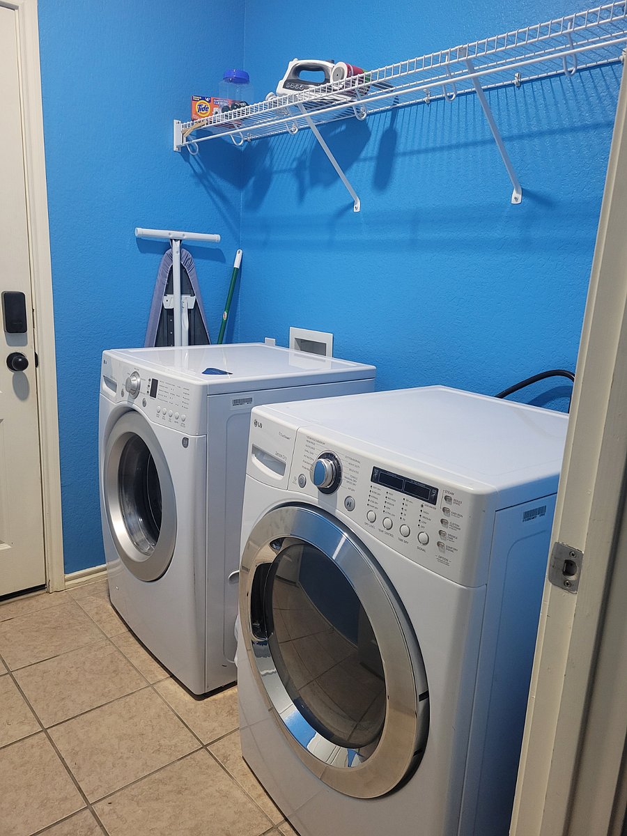 Laundry room with washer and dryer
Ironing Board and iron