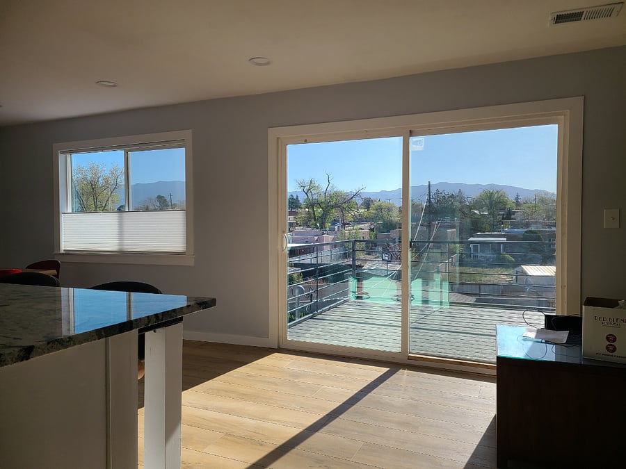 View looking out sliding glass doors.