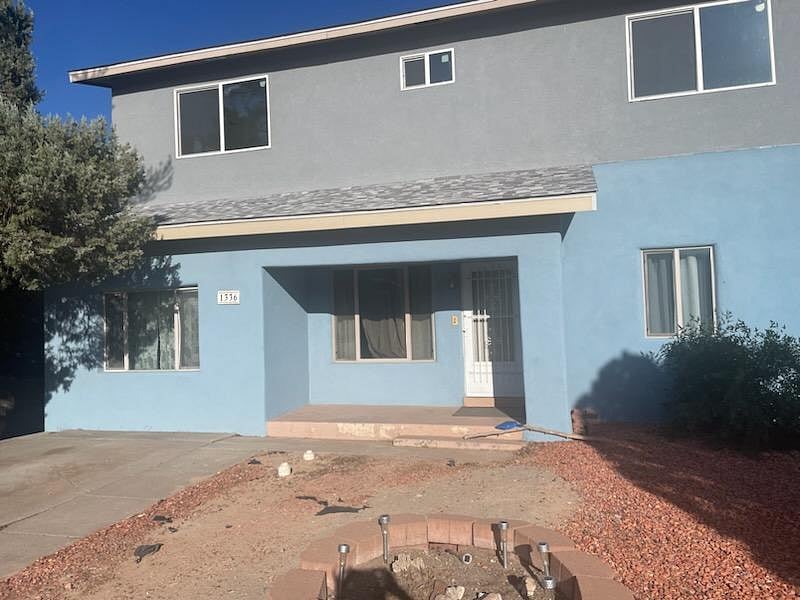 Front view of the house. Upstairs is the unit on furnished finders.
