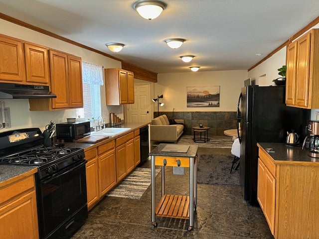 Kitchen, dining area and living room.