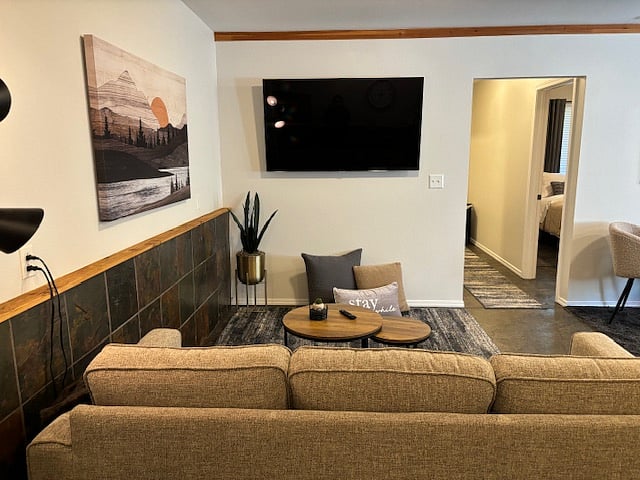 Living room with 60-inch TV (Firestick & Wi-Fi included)