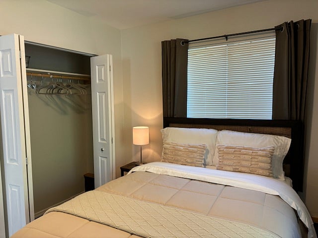 Bedroom #2
Closet with hangers, laundry basket and organizer. Dresser located opposite bed.