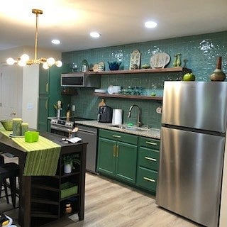 Eating area, full size stove and refrigerator. Along with dishwasher and panty cabinet.