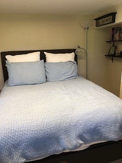 Queen bed with new bedding
