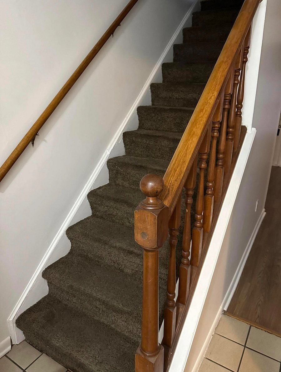 Stairs that lead up to the bedrooms