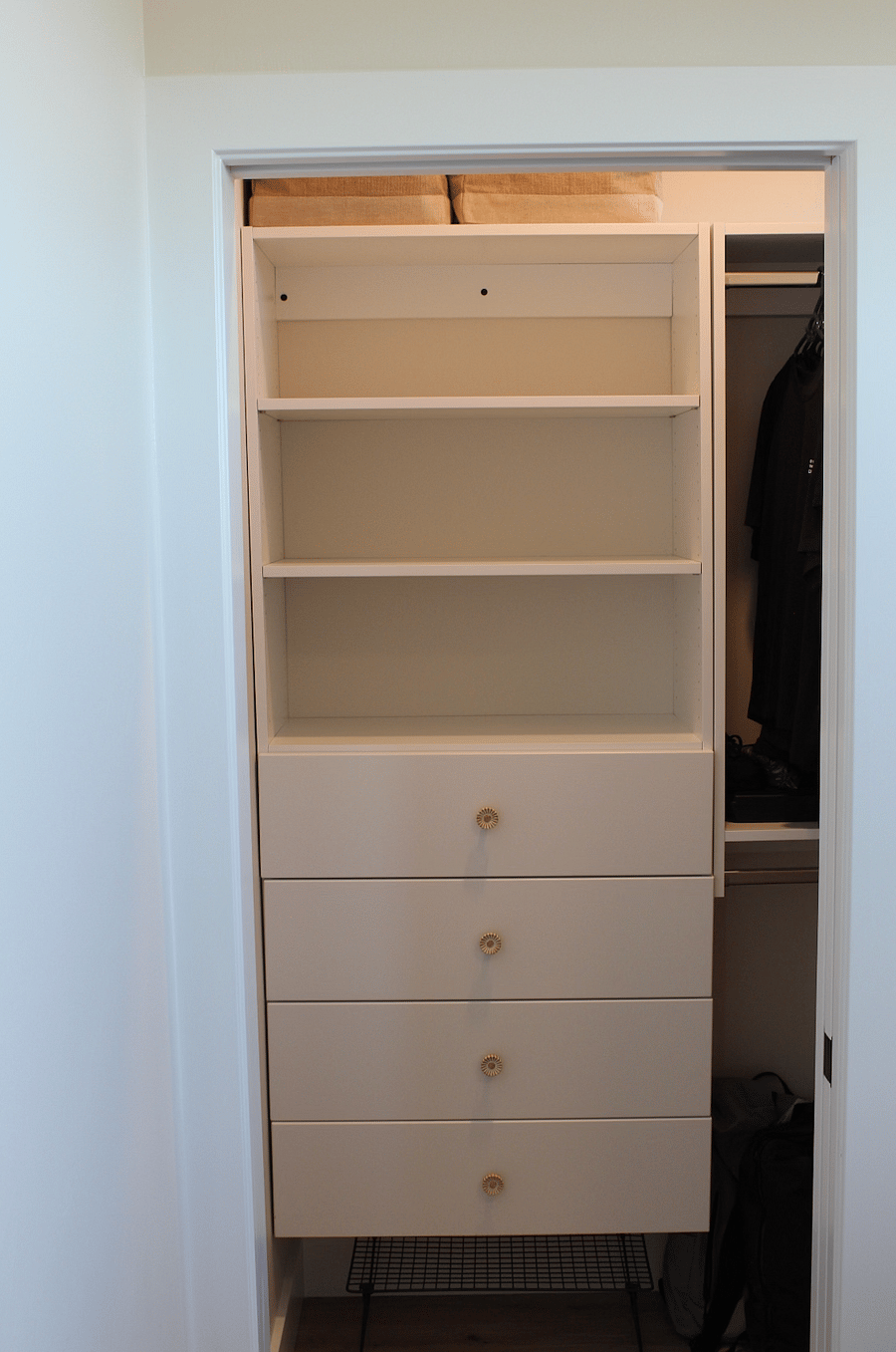 WALK IN CLOSET WITH BUILT IN STORAGE AND NATURAL LIGHT