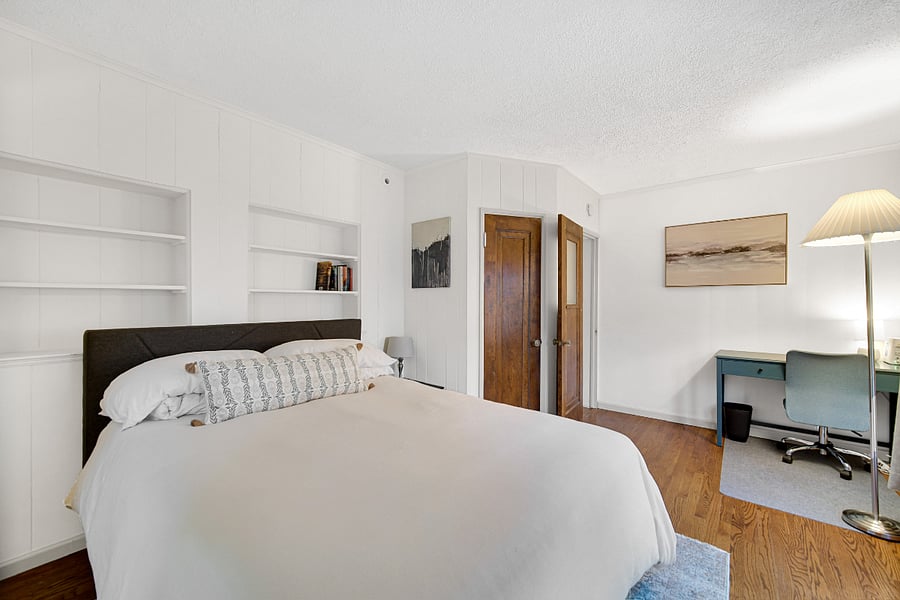 Queen room with ensuite bathroom. Queen bed, desk, dresser, flat screen TV and room darkening curtains. 