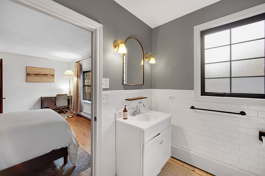 Ensuite bath from Queen room. Sink, toilet, clawfoot tub and shower. 
