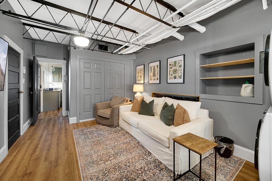 The media room comes off of the kitchen and is a cozy space to watch TV and relax at the end of the day. 