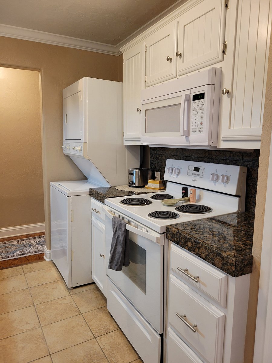 Washer/dryer. Stove, oven, microwave, toaster, pots, pans, cookware, utensils.