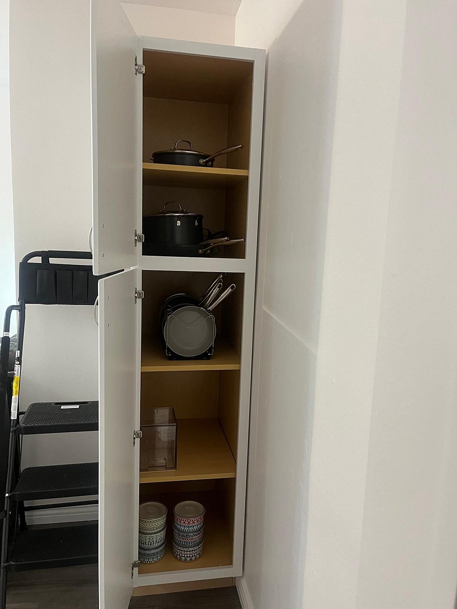 Pots and pans set, and lidded bowls for food storage.