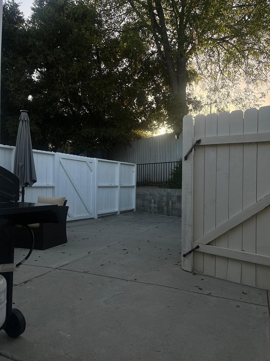 325 square feet backyard with privacy fence.