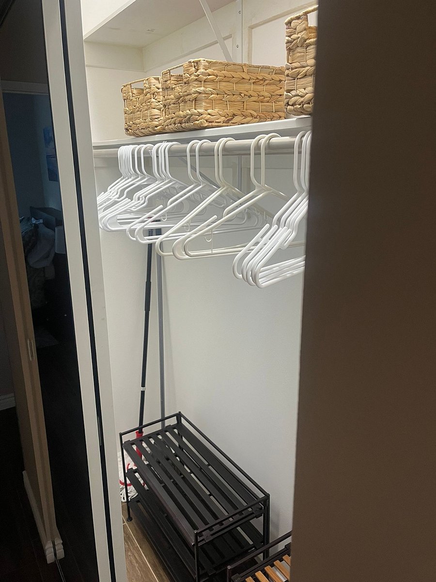 Big closet in the hallway. Shoe rack,  extra storage baskets, mop, broom, tripod clothes drying rack, hangers, and dustpan set available. (Left side)
