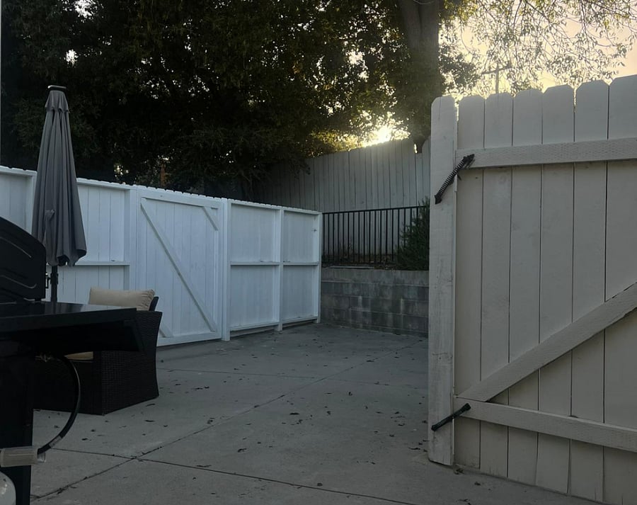 325 square feet backyard with privacy fence