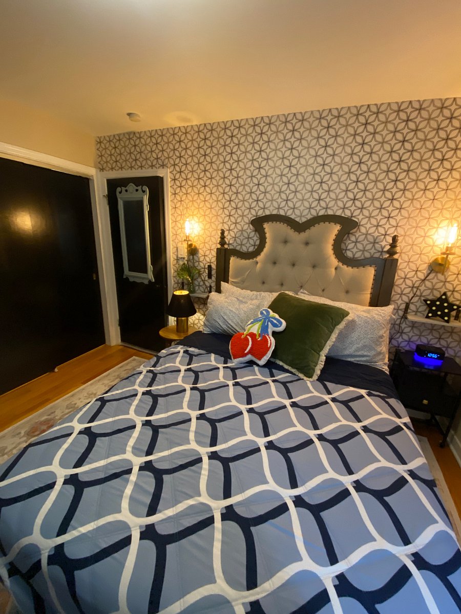 Upscale, fully furnished private room with abundant natural light and premium finishes.