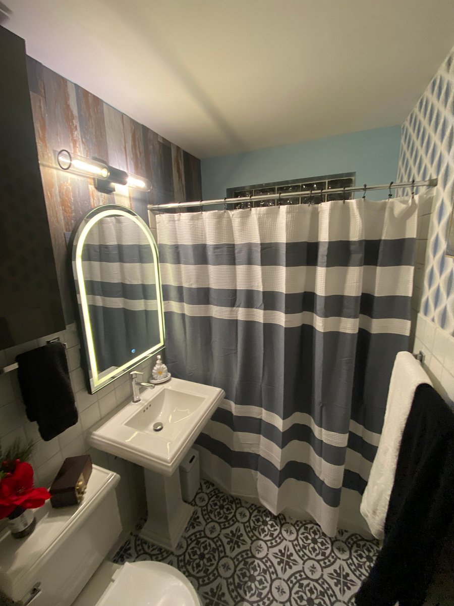 Main bath with tub and shower