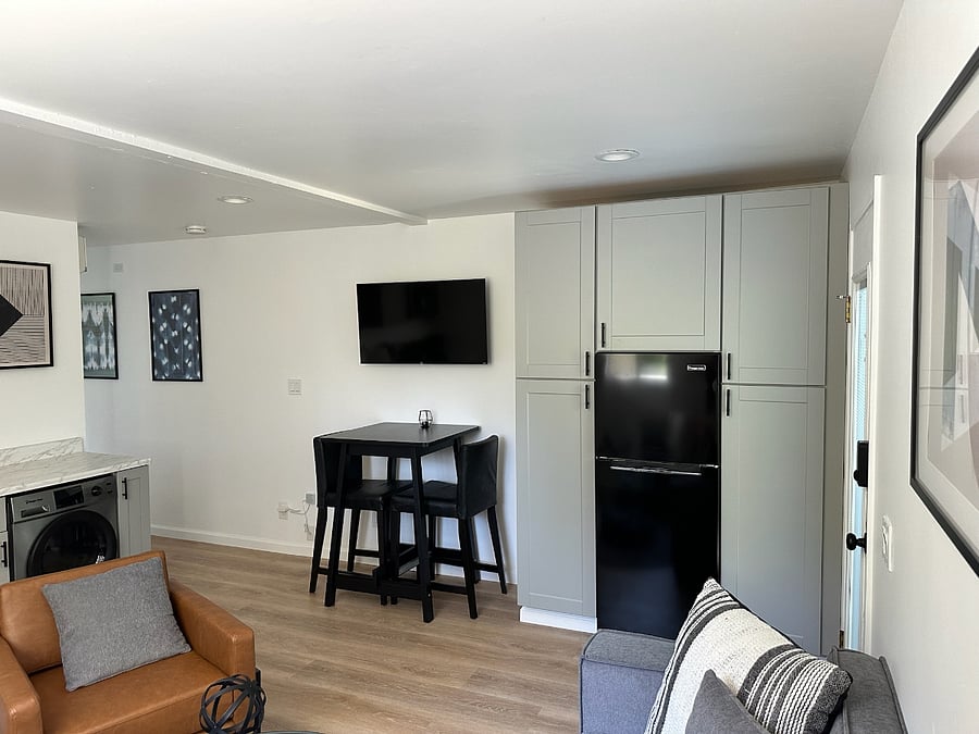 Full fridge and plenty of storage cabinets