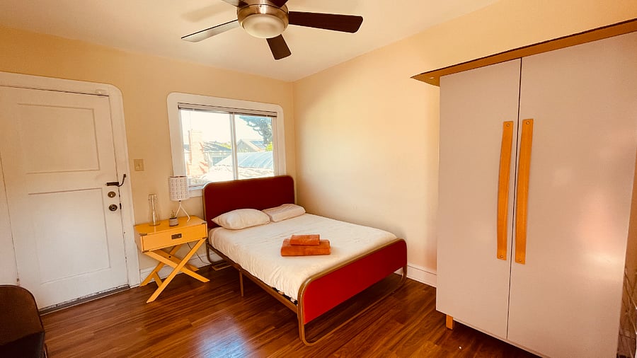 Guest room, 130 sqf of space with double bed, and memory foam matress. The room has its own small patio just outside and easy access to back yard.  

