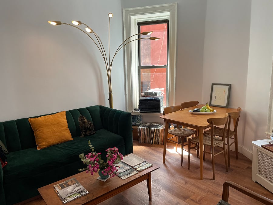 The shared living room and dining room with direct sun the afternoon