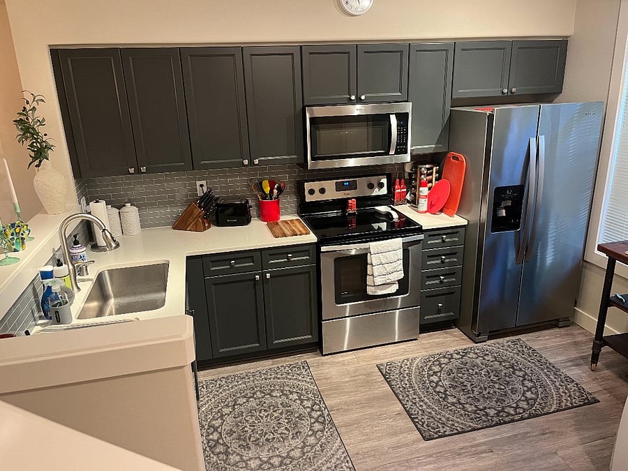 Kitchen with toaster oven and coffee bar not shown.