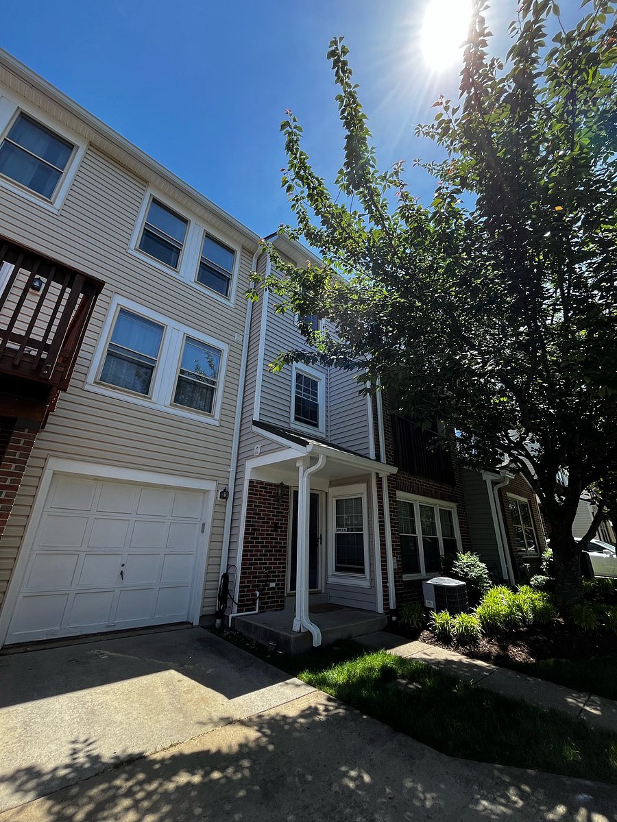 Outside view of townhome with garage