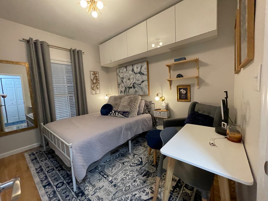 2nd bedroom w/ queen bed, firm memory foam mattress, all bedding included, desk, reading nook, dresser, TV, closet, and additional cabinet storage