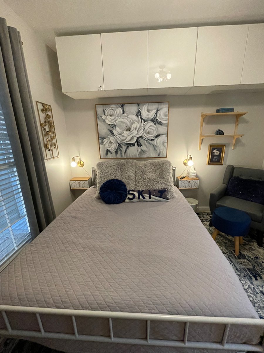 2nd bedroom w/ queen bed, firm memory foam mattress, all bedding included, desk, reading nook, dresser, TV, closet, and additional cabinet storage