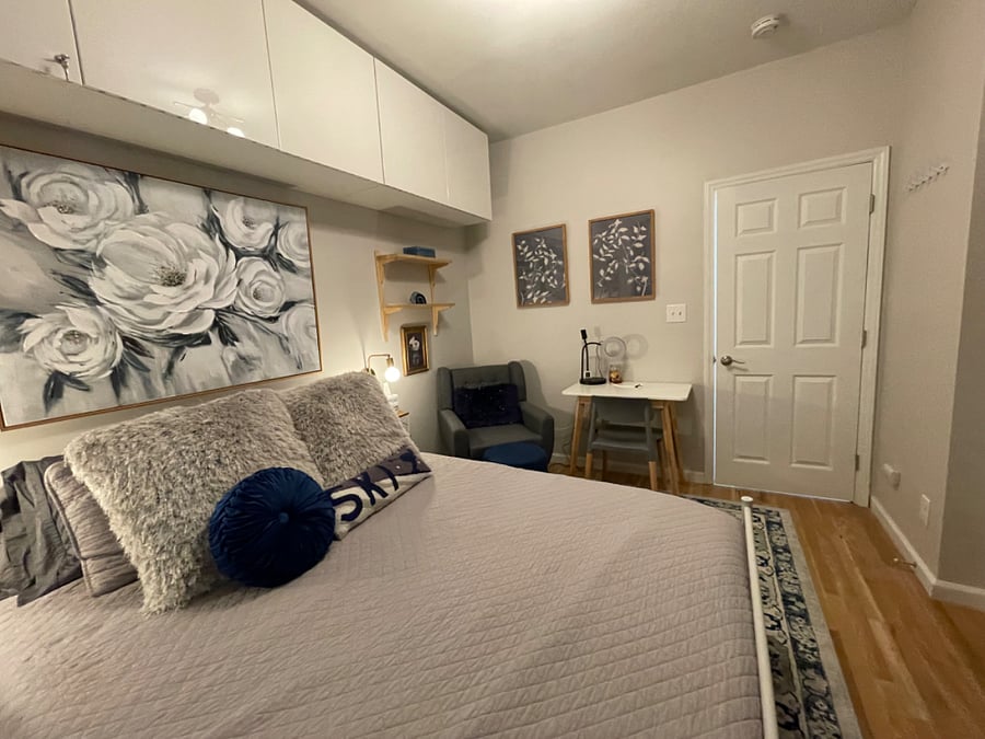 2nd bedroom w/ queen bed, firm memory foam mattress, all bedding included, desk, reading nook, dresser, TV, closet, and additional cabinet storage