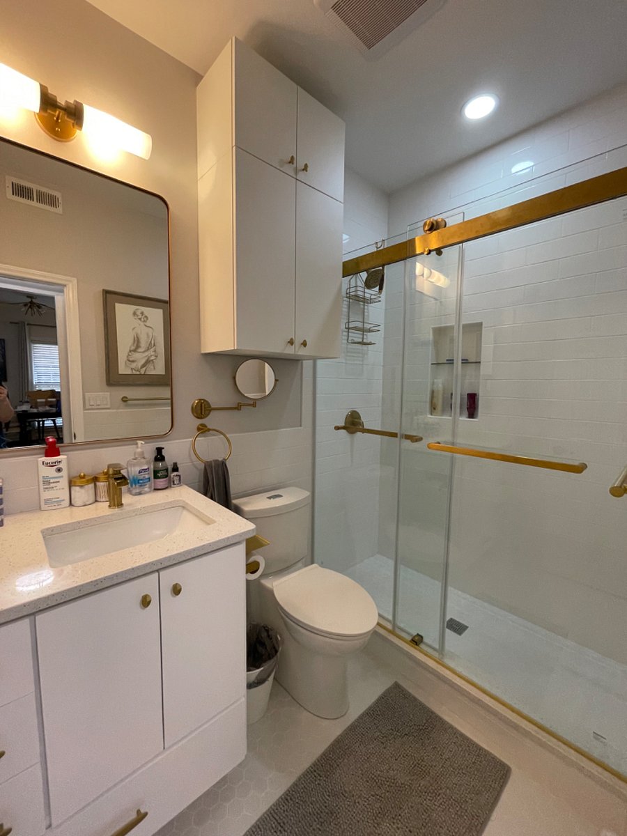 Fully renovated (2024) bathroom with stand-up shower, vanity, and plenty of storage