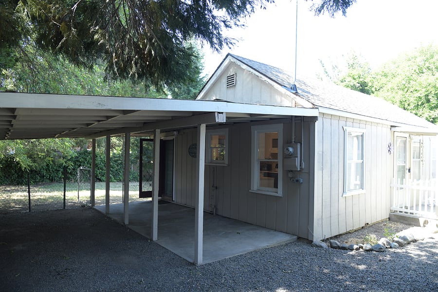 Carport and back door.
