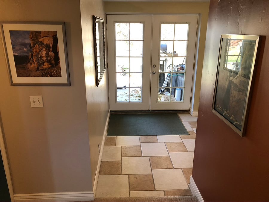 Landing for gear storage and french doors to outdoor patio, grill, and hot tub (shared with landlords)