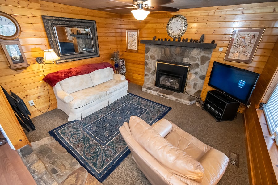 Cozy up and relax near the gas fireplace and enjoy your favorite tv shows or a good book here. Couch pulls out into a bed for 2.