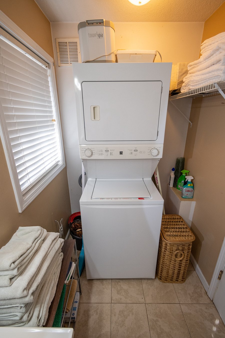 Washer and dryer located in the bathroom.