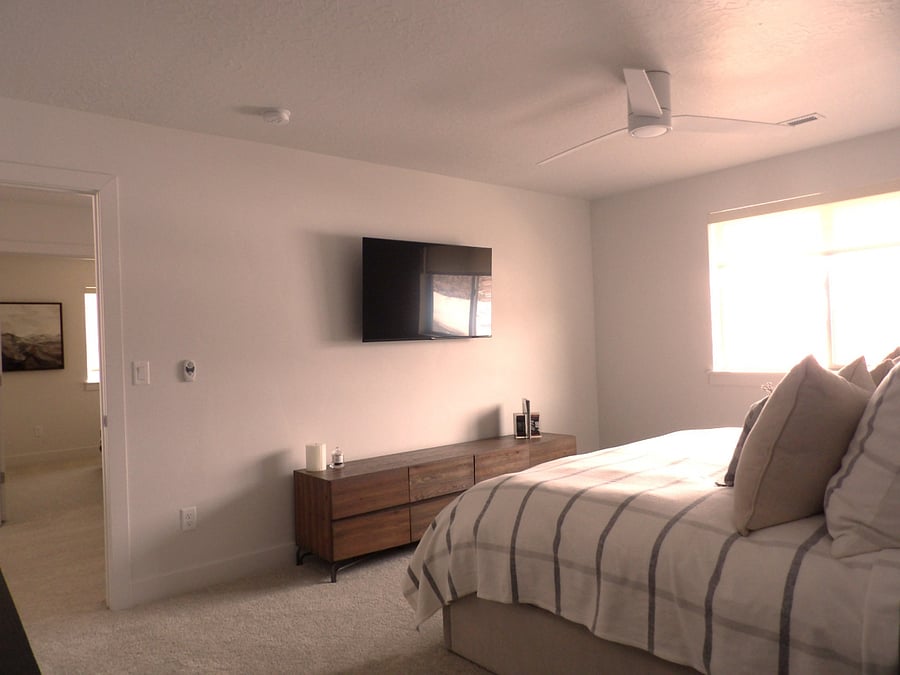 Master bedroom view with smart TV